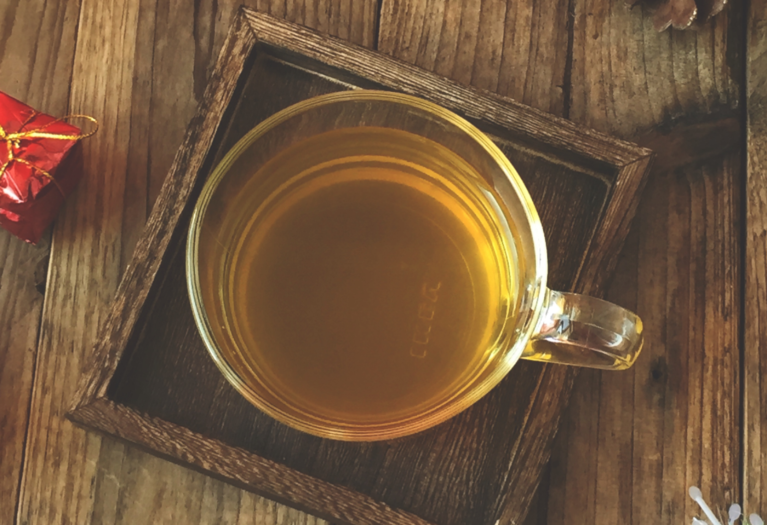 Brew tea, pour into cup, and enjoy comforting jasmine tea.