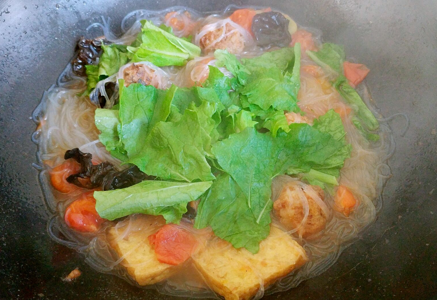 Add baby bok choy to the stir-fry and cook until done.