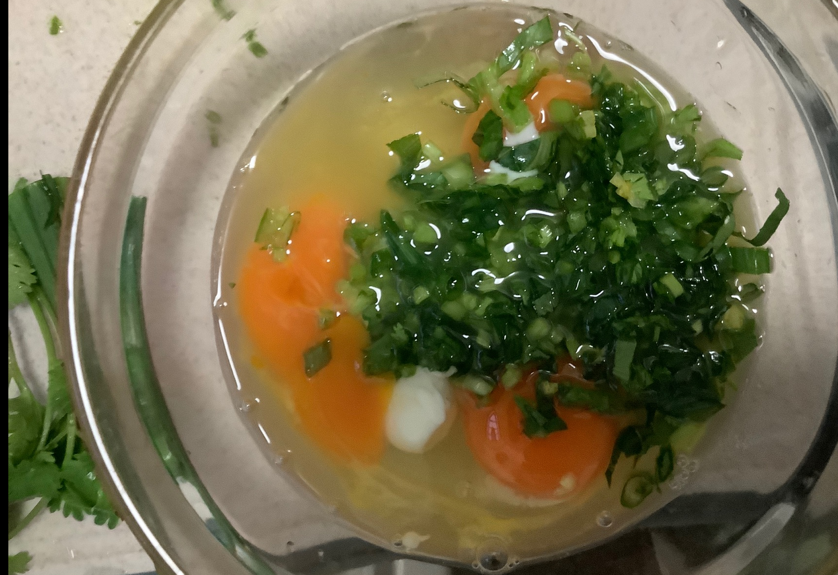 Add celery, leafy greens, green onion, cheese, and yogurt to eggs.