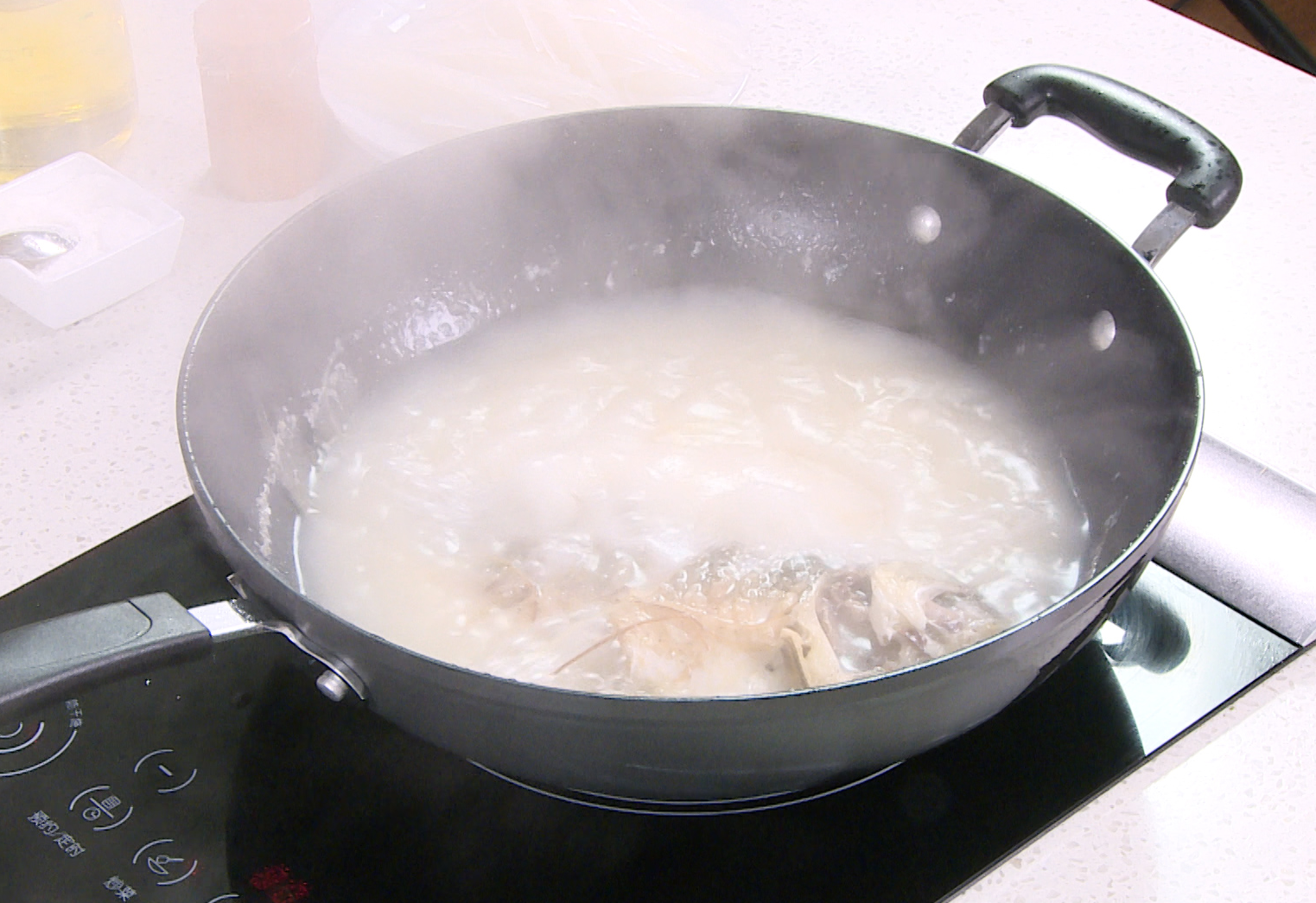 Simmer the fish in hot water for 10-15 mins until broth turns milky white. Tip: Use hot water for better flavor.