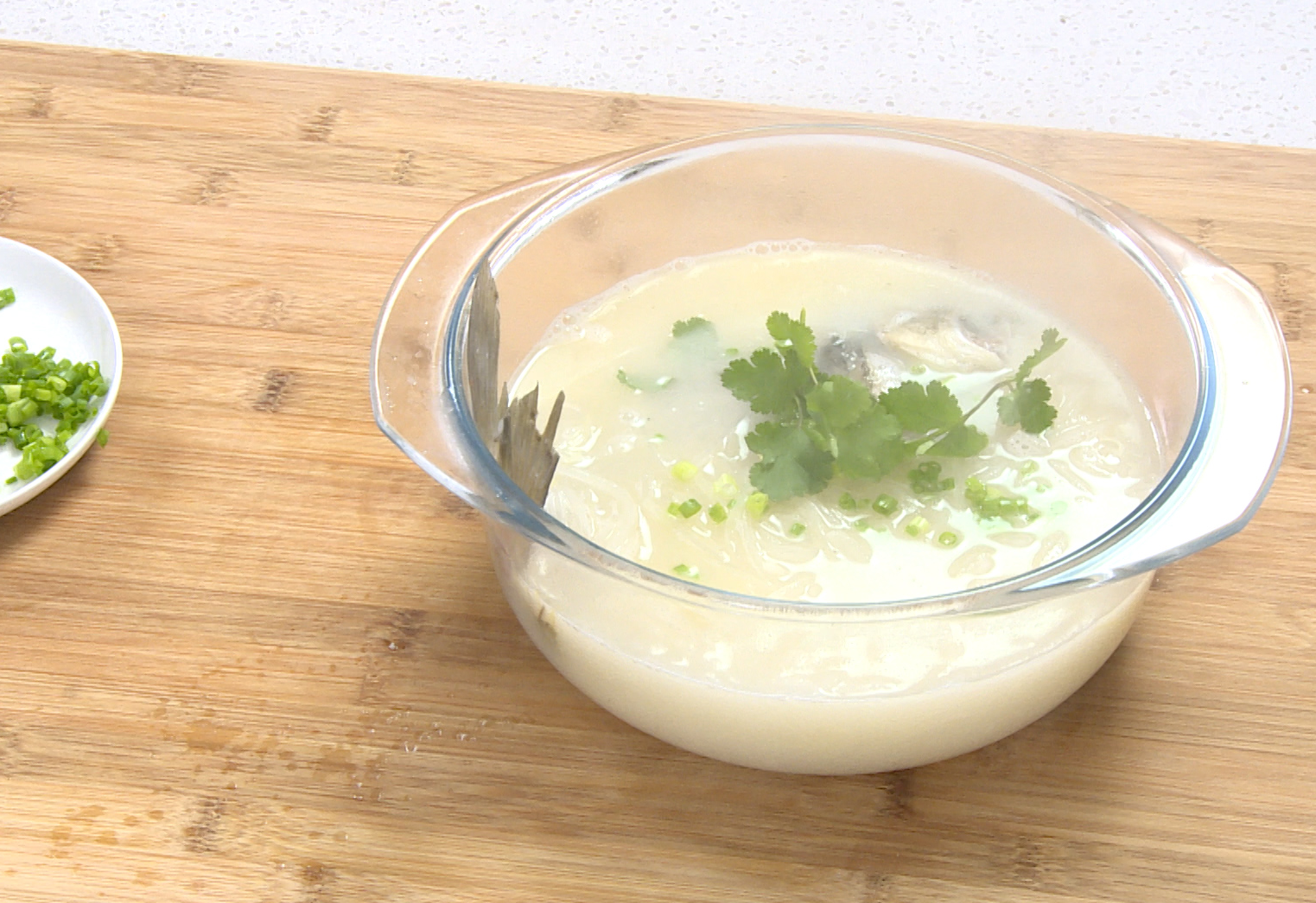 Garnish soup with green onions and cilantro before serving.