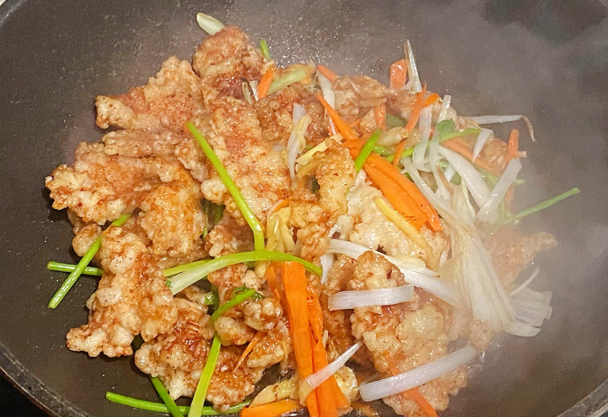 Pour the sauce around the edges of the pan for even distribution.