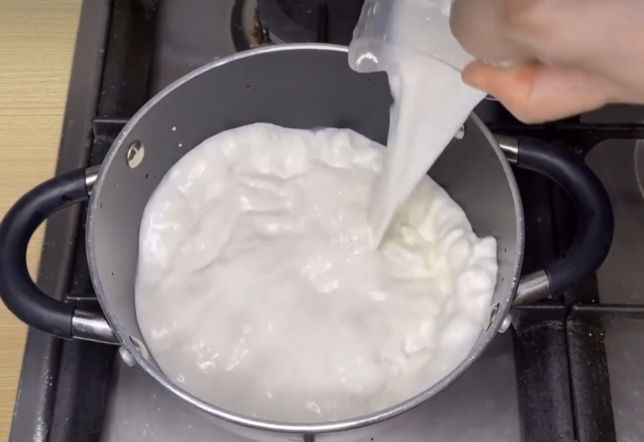 Heat whole milk in a saucepan over medium-low heat, stirring continuously.