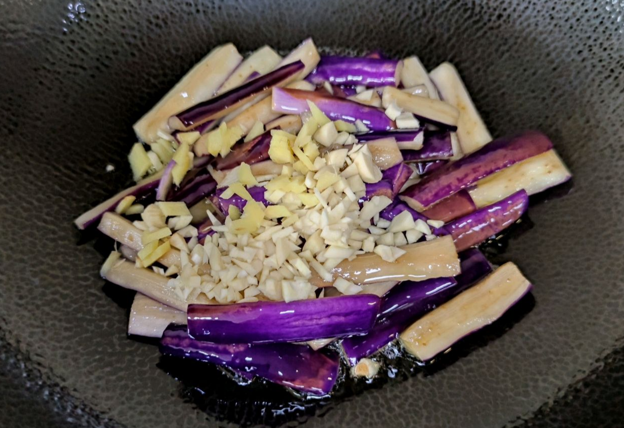 Add minced garlic and chopped ginger for a flavorful touch.