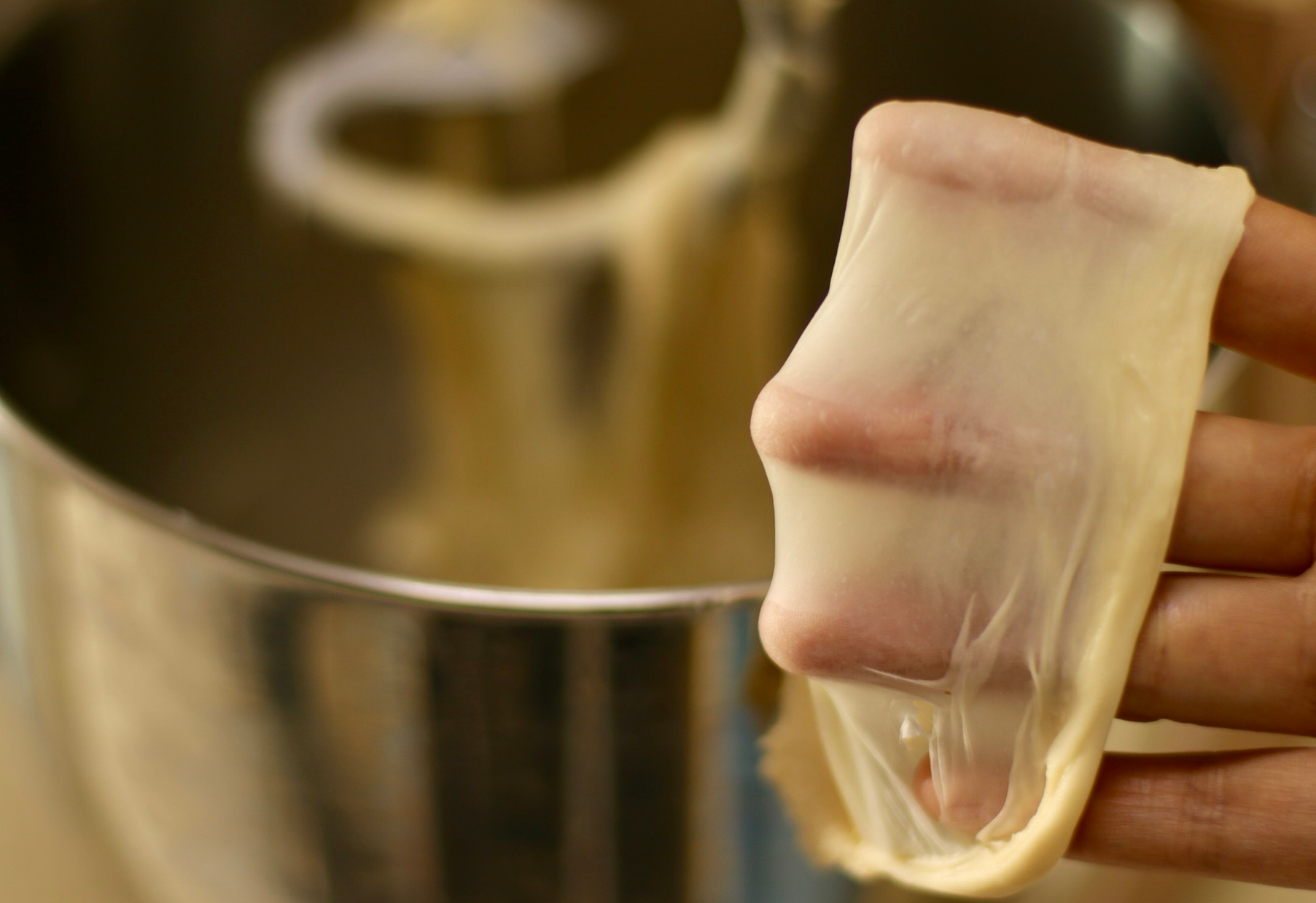 Knead dough until stretchy for thin membrane texture.