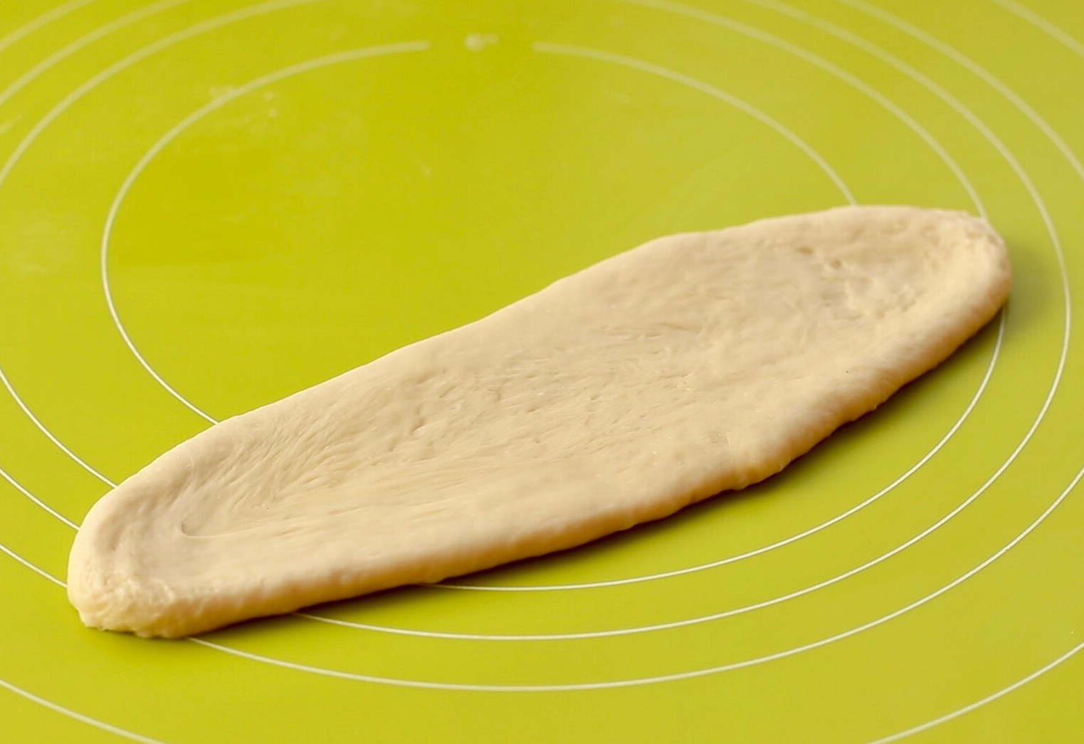 Rotate the dough horizontally.