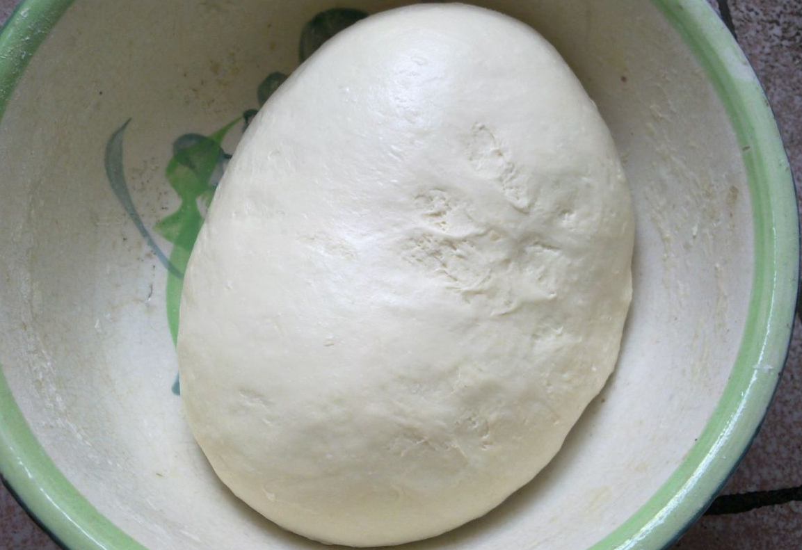 Mix flour and warm water, knead, let rest, then knead again for smooth dough.