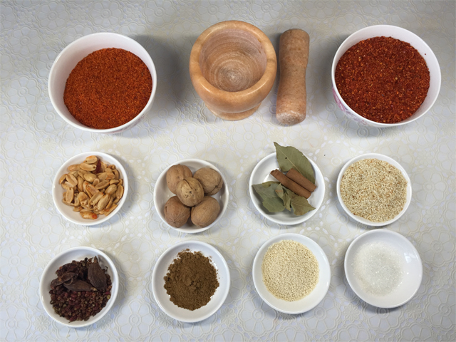 Ingredients for homemade chili oil with a variety of spices and nuts.