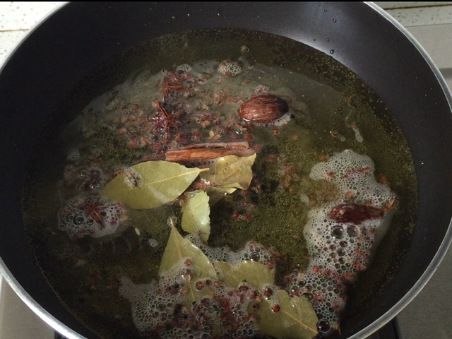 Heat canola oil with spices for 5-8 minutes; adds flavor to chili oil.