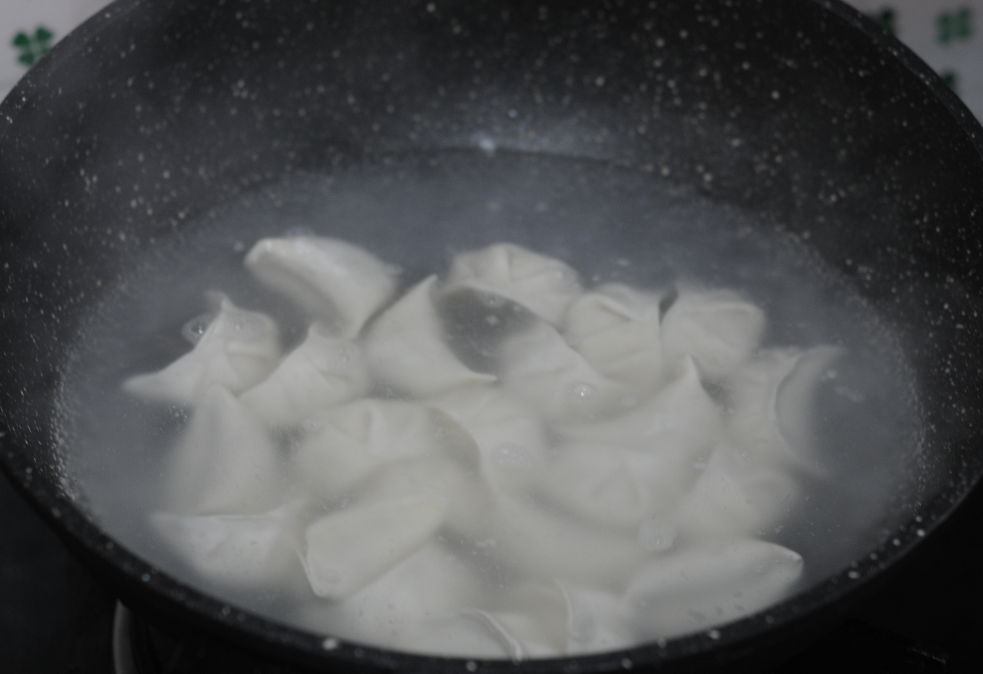 Boil dumplings, add cold water, boil again, repeat, until cooked.