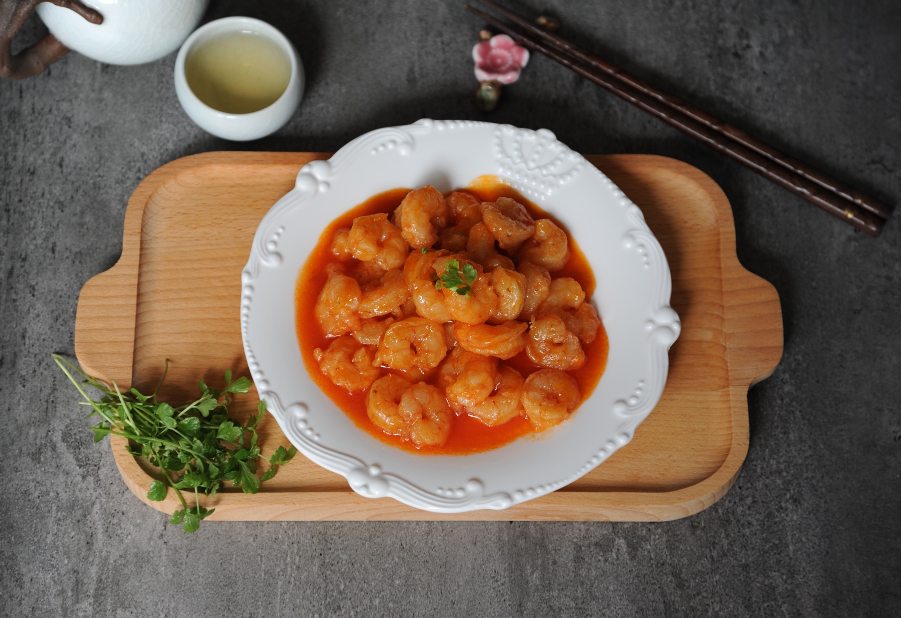 Thicken sauce, transfer, and serve Lobster Sauce Shrimp.