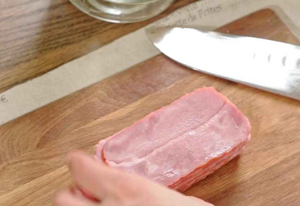 Cut bacon into small cubes.