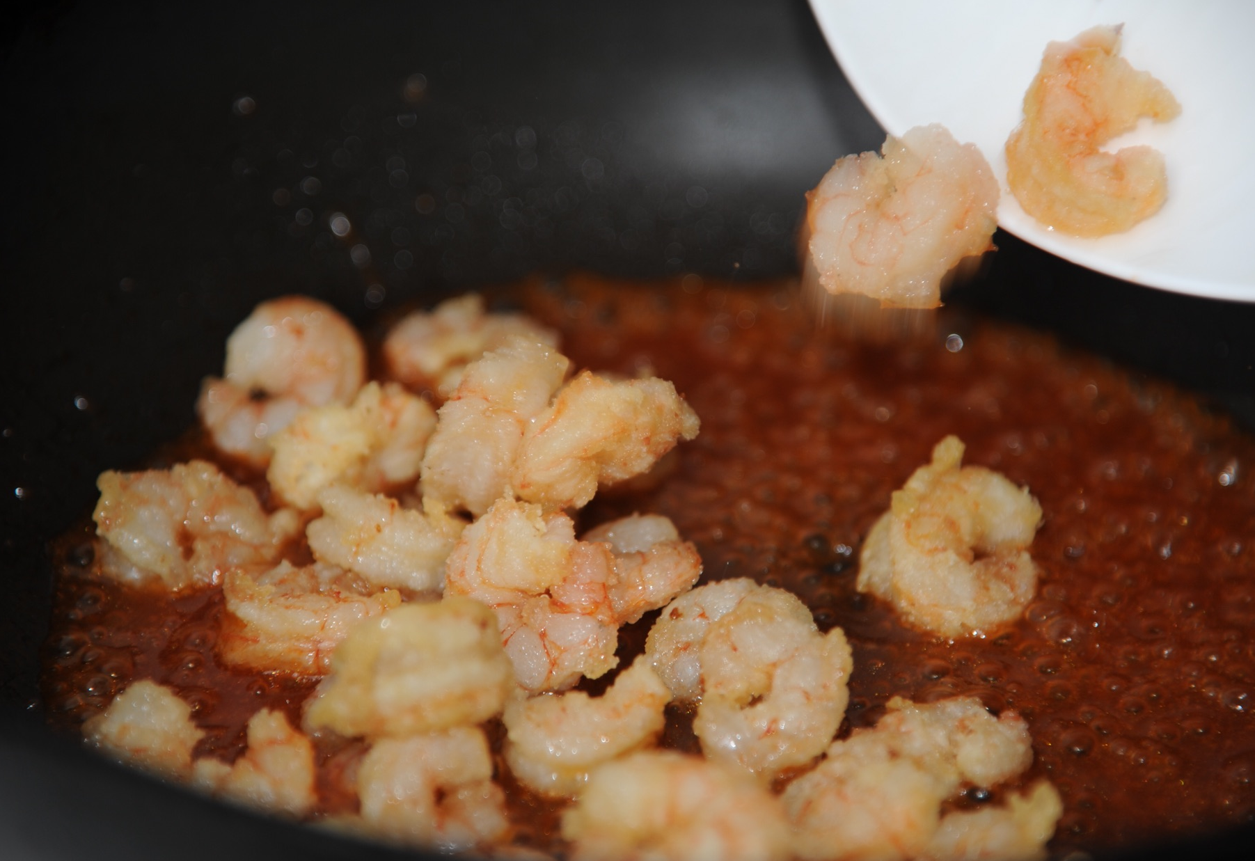 Include fried shrimp in the dish.