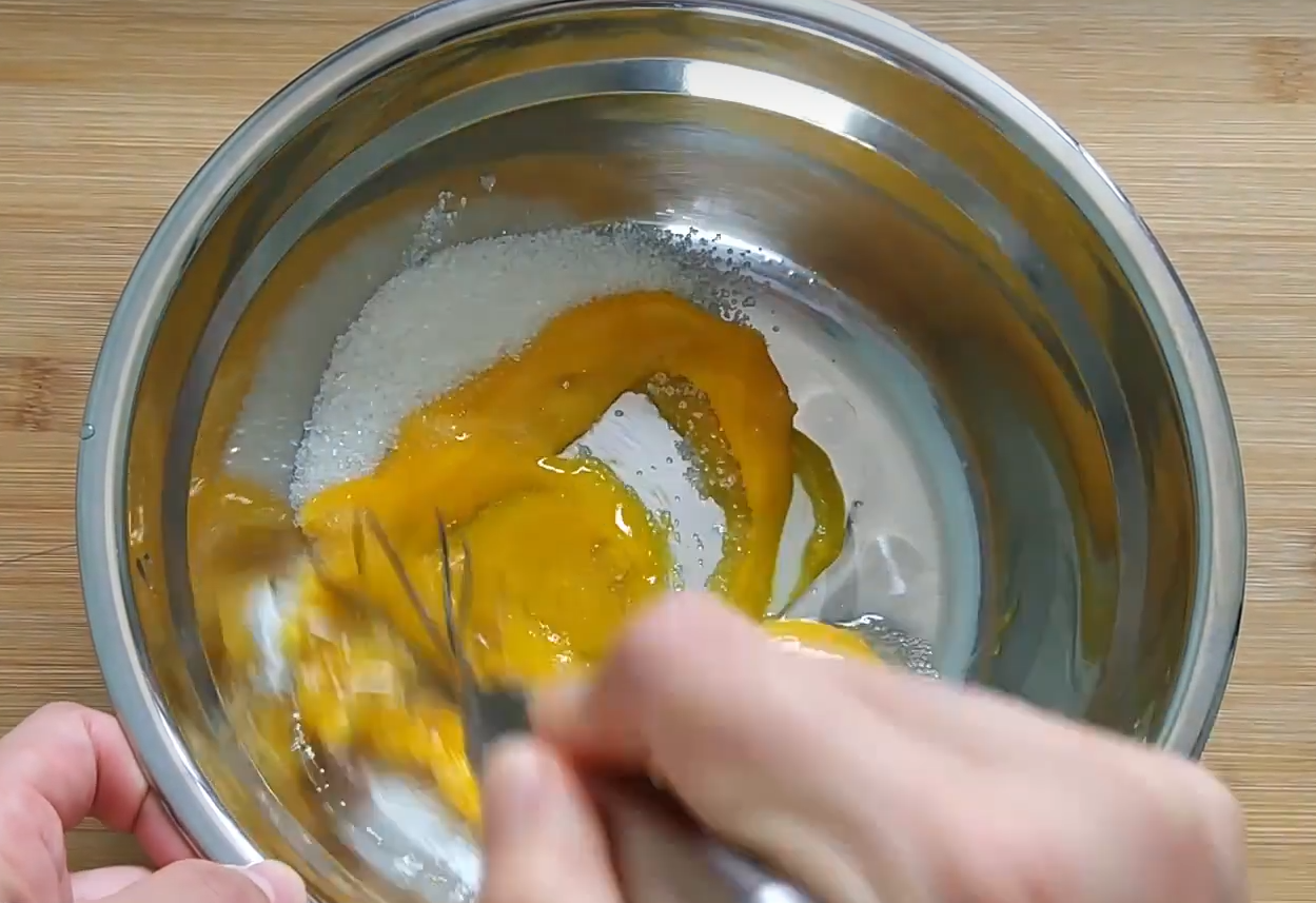 Whisk egg yolks and sugar until well combined.