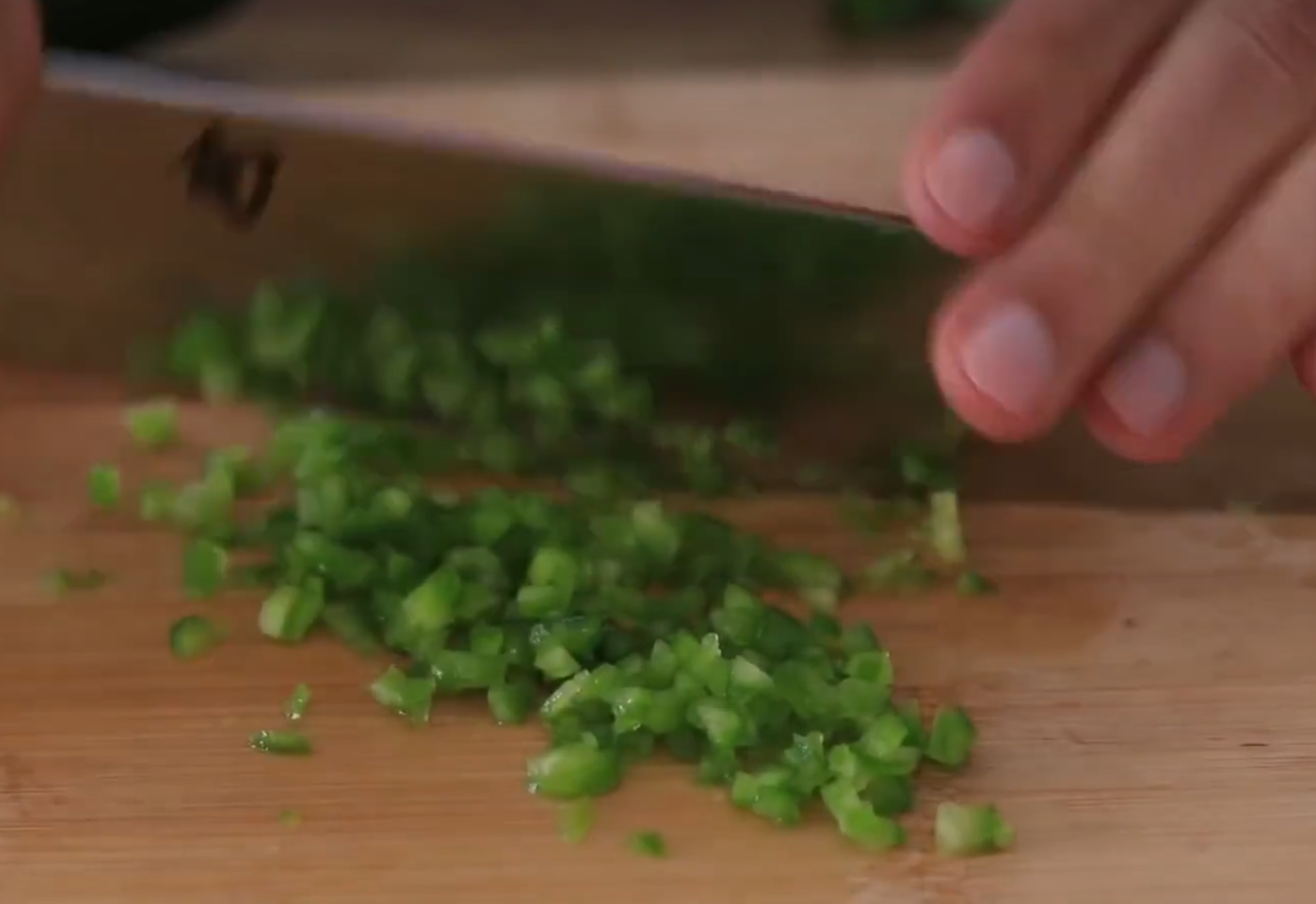 Prepare 15g of green chili by washing & finely chopping.