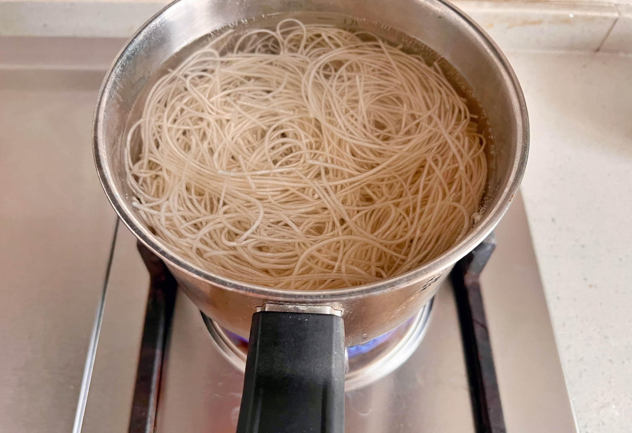 Cook sweet potato starch noodles by boiling water after 30 minutes.