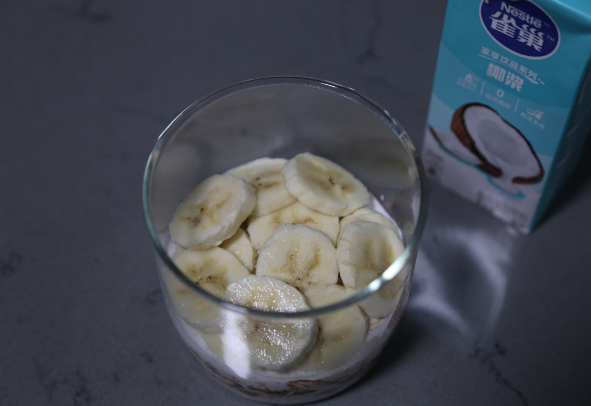 Add 50g of banana slices as another layer.