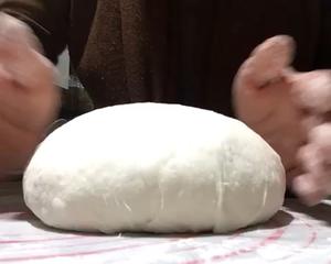 Summary: Fold dough sides down towards bottom while rotating for tightness in a simple rounding method.