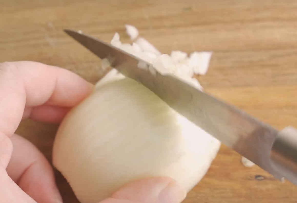 Chop 50g of onion finely for cooking.