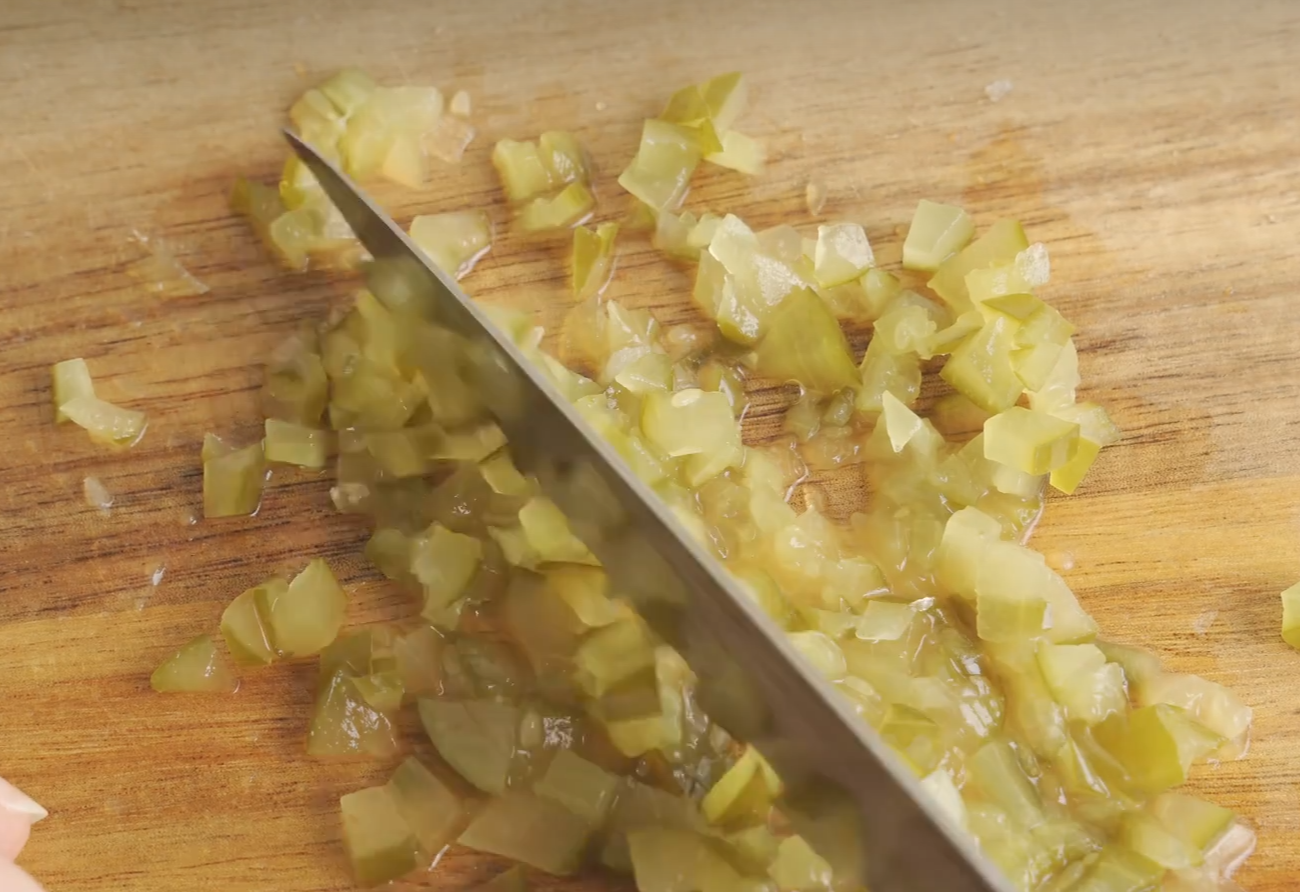 Finely chop 25g pickles or substitute with other acidic ingredients.