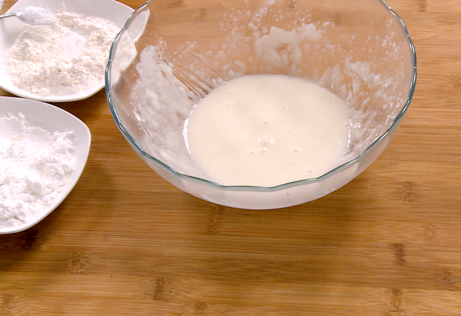 Make a batter with egg whites, salt, cornstarch, and flour. Adjust thickness to coat mushrooms.