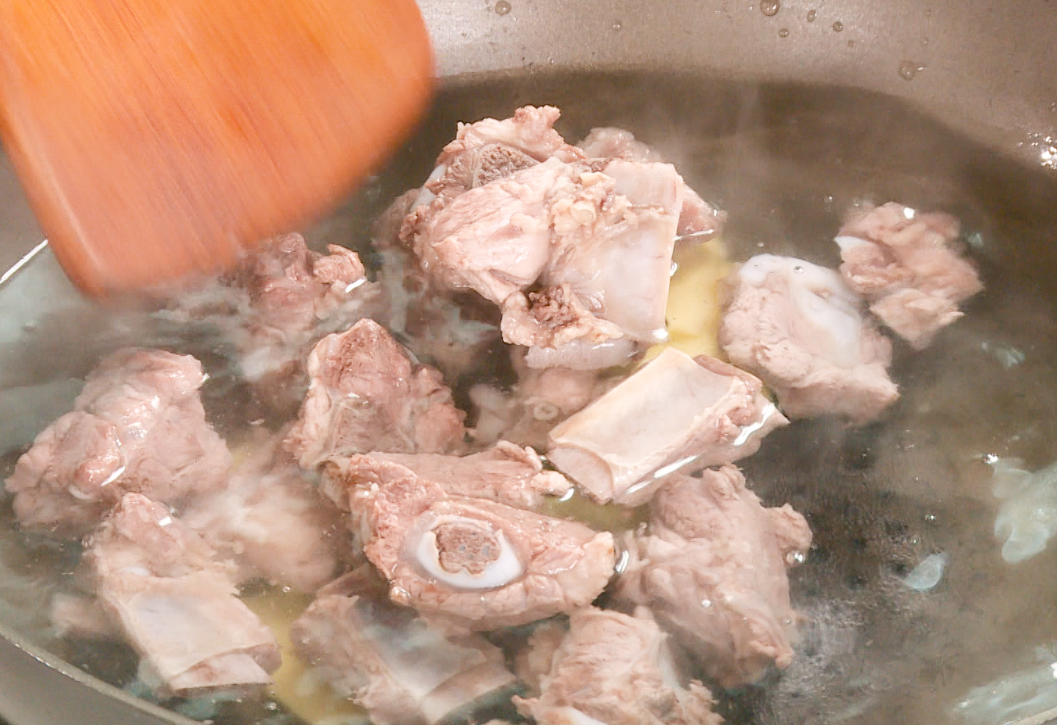 Simmer the pork ribs