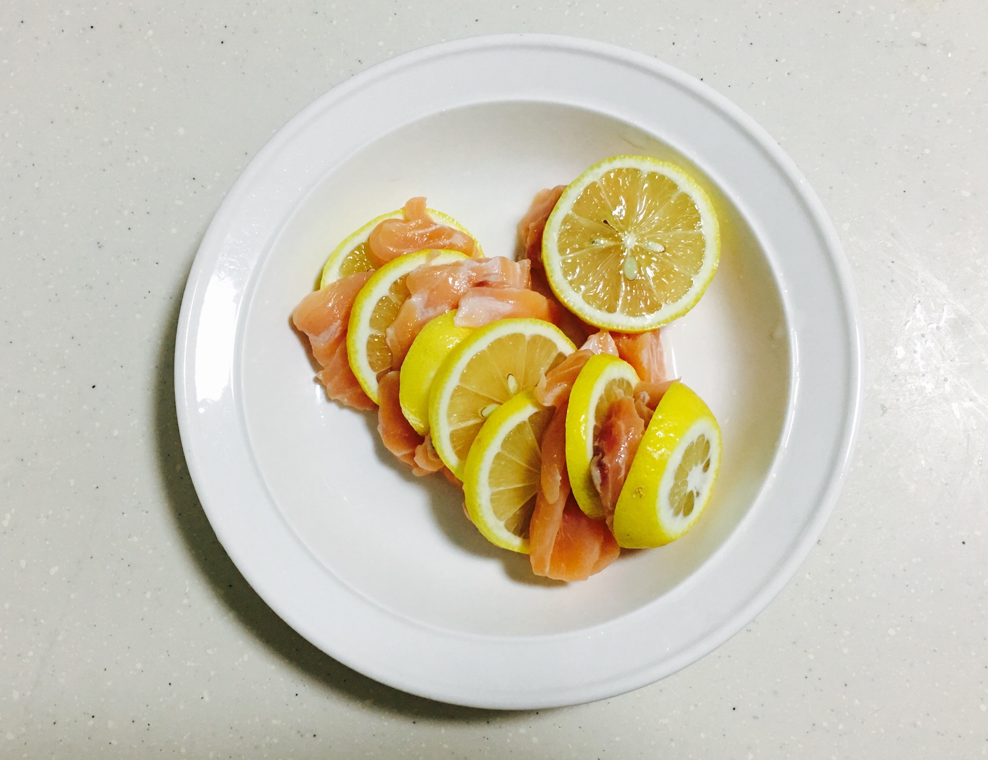 salmon pieces with lemon