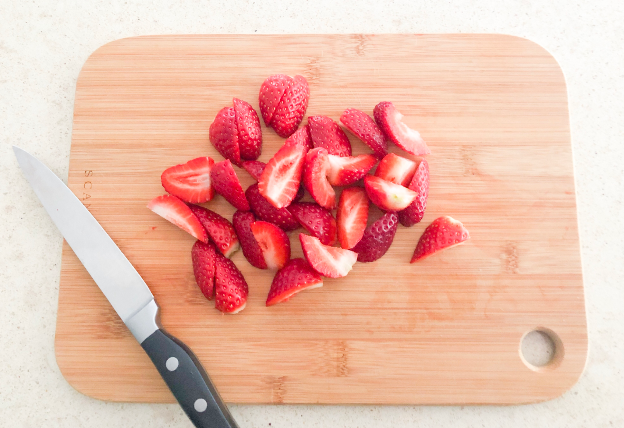 Slice strawberries