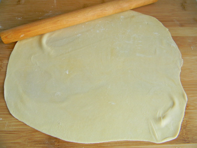 roll the rested dough into a large thin sheet