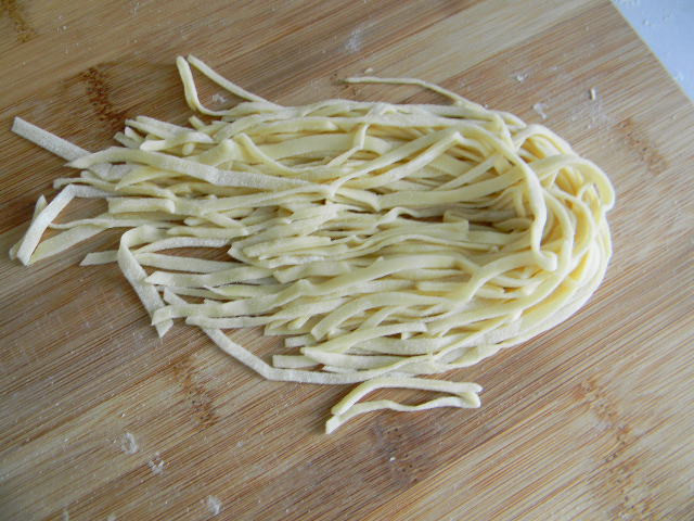 Unfold the strips to reveal the noodles