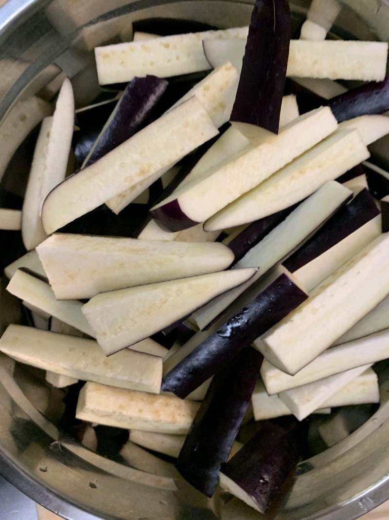 Cut the eggplant into 1-inch long strips