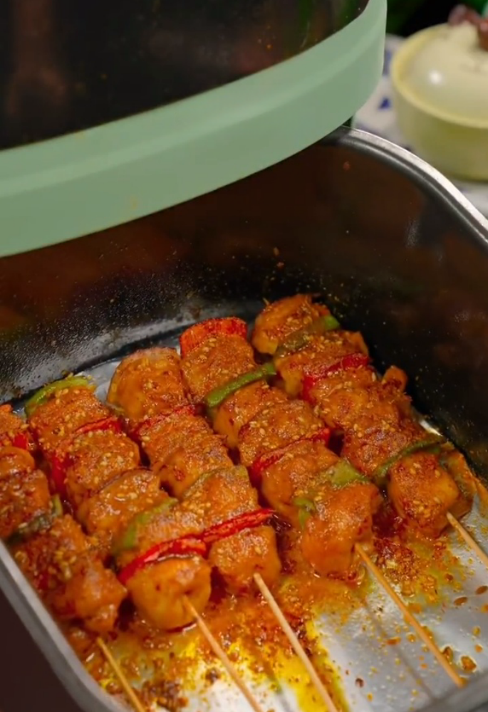 Place the chicken breasts back into the air fryer