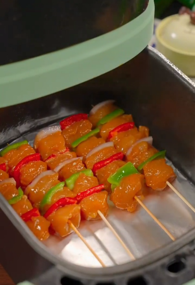 Line an air fryer with flat tinfoil