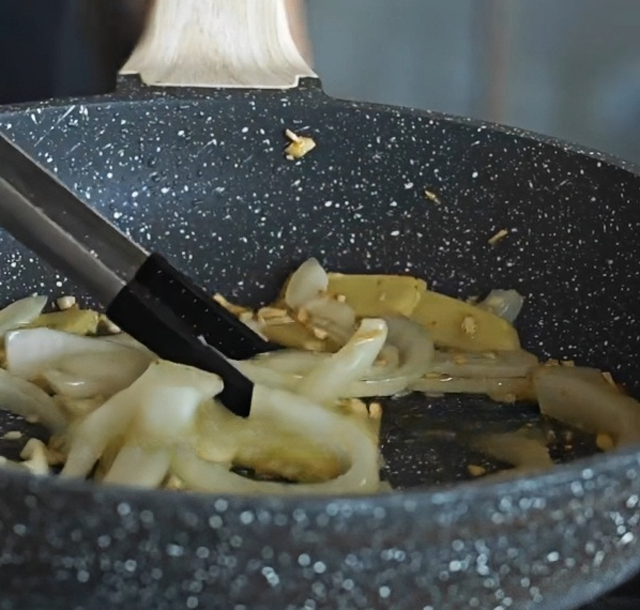 Then stir-fry the ingredients.