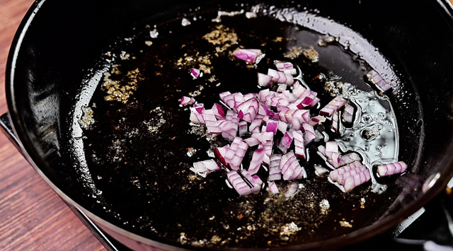 Then pour in the onion and fry until fragrant