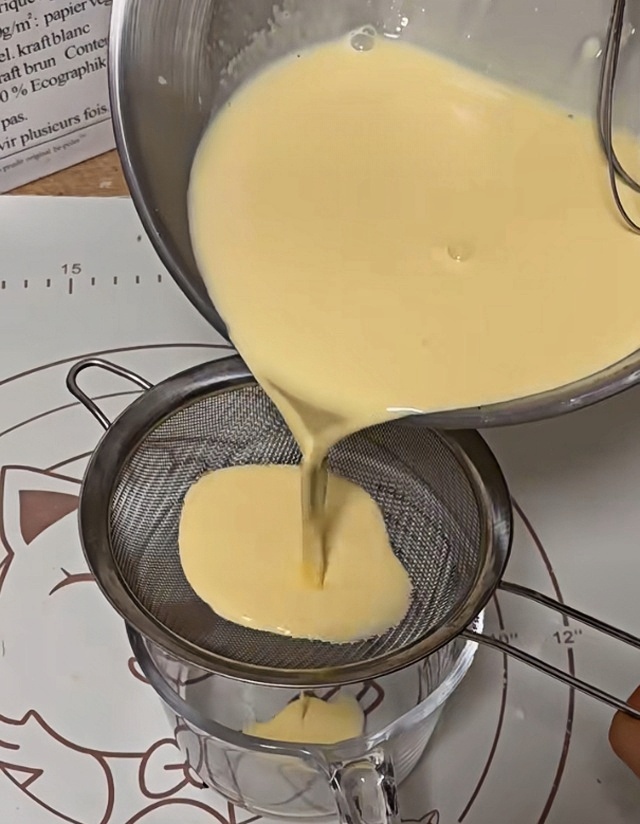 Strain the mixture to ensure a smooth custard