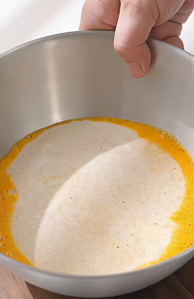 Combine almond milk and egg yolk mixture